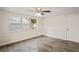 Bright dining room featuring tile floors and a ceiling fan at 3403 Overland Dr, Holiday, FL 34691