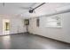 Spacious garage with ample storage space and a separate door to backyard at 3403 Overland Dr, Holiday, FL 34691