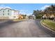 Community entrance with signage and flag at 3875 Mariner Dr, St Petersburg, FL 33705
