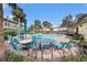 Enjoyable community pool with plenty of lounge chairs at 3875 Mariner Dr, St Petersburg, FL 33705