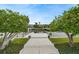 Steps lead to a spacious waterfront dock, perfect for relaxing and enjoying the view at 3939 Venetian Way, Tampa, FL 33634