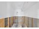 Unfinished basement with exposed walls and partial flooring, ready for renovation at 3939 Venetian Way, Tampa, FL 33634