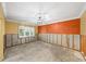 Bedroom undergoing renovation, with exposed framing and new flooring at 3939 Venetian Way, Tampa, FL 33634