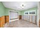Renovation in progress, showing a bedroom with damaged walls and flooring at 3939 Venetian Way, Tampa, FL 33634