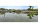 Tranquil waterfront view with neighboring houses and boats at 3939 Venetian Way, Tampa, FL 33634
