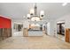Open concept dining area with kitchen and pool views at 3939 Venetian Way, Tampa, FL 33634