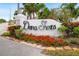 Community entrance sign of Dana Shores at 3939 Venetian Way, Tampa, FL 33634
