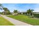 Single-Gathering house with a large front yard at 3939 Venetian Way, Tampa, FL 33634