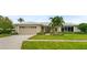 Beautiful single-Gathering home with a well-manicured lawn at 3939 Venetian Way, Tampa, FL 33634