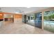 Gathering room with pool view and sliding glass doors at 3939 Venetian Way, Tampa, FL 33634