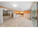 Gathering room with view of kitchen and sliding doors at 3939 Venetian Way, Tampa, FL 33634