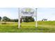 Sign for Rocky Point Golf Course, showing course information at 3939 Venetian Way, Tampa, FL 33634