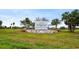 Sign for Rocky Point Golf Course, advertising nearby amenities at 3939 Venetian Way, Tampa, FL 33634