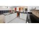 Kitchen with white cabinets, black countertops, and new appliances at 3939 Venetian Way, Tampa, FL 33634