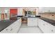 Kitchen with black countertops and a stylish black and white floor at 3939 Venetian Way, Tampa, FL 33634