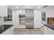 Modern kitchen with stainless steel refrigerator and microwave at 3939 Venetian Way, Tampa, FL 33634