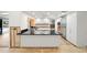 Renovation kitchen with island and stainless steel appliances at 3939 Venetian Way, Tampa, FL 33634