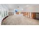 Living room undergoing renovation, with exposed framing and new flooring at 3939 Venetian Way, Tampa, FL 33634
