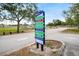 Signpost showing directions to various park amenities at 3939 Venetian Way, Tampa, FL 33634