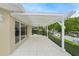 Covered patio with tile flooring and water views at 3939 Venetian Way, Tampa, FL 33634
