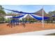playground with shade structures and play equipment at 3939 Venetian Way, Tampa, FL 33634