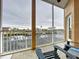 Screened balcony overlooking the water and marina at 4178 Des Prez Ct, Hernando Beach, FL 34607