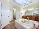 Primary bathroom with a large soaking tub and walk-in shower at 4178 Des Prez Ct, Hernando Beach, FL 34607