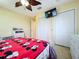 Mickey Mouse themed bedroom with double doors to closet at 4178 Des Prez Ct, Hernando Beach, FL 34607