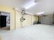 Garage with bikes and storage, offering additional space for parking and storage at 4178 Des Prez Ct, Hernando Beach, FL 34607