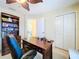 Home office features built-in shelving and a large desk at 4178 Des Prez Ct, Hernando Beach, FL 34607