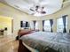 Main bedroom with TV and access to bathroom at 4178 Des Prez Ct, Hernando Beach, FL 34607