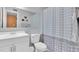 Clean bathroom with white vanity, toilet and shower/tub combo at 4215 E Bay Dr # 1702A, Clearwater, FL 33764