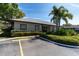 Community clubhouse with landscaping and parking at 4215 E Bay Dr # 1702A, Clearwater, FL 33764