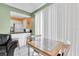Small kitchen with white appliances and breakfast bar at 4215 E Bay Dr # 1702A, Clearwater, FL 33764