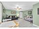 Living room with daybed and dining area at 4215 E Bay Dr # 1702A, Clearwater, FL 33764