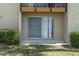 Private patio with sliding glass doors and a balcony at 4215 E Bay Dr # 1702A, Clearwater, FL 33764