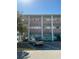 Two-story building exterior with parking in front at 4300 58Th N St # 2000, Kenneth City, FL 33709