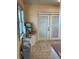 Kitchen with window, access door, and additional cabinets at 4300 58Th N St # 2000, Kenneth City, FL 33709
