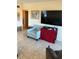 Living room with tiled floor, TV, and seating at 4300 58Th N St # 2000, Kenneth City, FL 33709