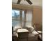 Living room with two sofas and large window at 4300 58Th N St # 2000, Kenneth City, FL 33709