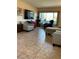 Living room with tiled floor and comfy furniture at 4300 58Th N St # 2000, Kenneth City, FL 33709