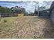 Fenced backyard offering ample space and privacy at 7318 Dianne Dr, New Port Richey, FL 34652