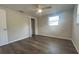Spacious bedroom featuring a large closet and vinyl flooring at 7318 Dianne Dr, New Port Richey, FL 34652