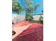 Small patio area with white fence at 7634 Desoto Ct, Tampa, FL 33615