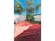 Small fenced backyard with patio, providing private outdoor space at 7634 Desoto Ct, Tampa, FL 33615