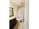 Clean bathroom with updated vanity and shower at 7634 Desoto Ct, Tampa, FL 33615