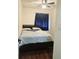 Cozy bedroom with a double bed and dark-colored furniture at 7634 Desoto Ct, Tampa, FL 33615