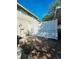 Private gated entrance with covered carport parking at 7634 Desoto Ct, Tampa, FL 33615