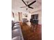 Living Room with grey couches and a large TV at 7634 Desoto Ct, Tampa, FL 33615