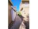 Sidewalk between buildings providing access to rear of property at 7634 Desoto Ct, Tampa, FL 33615